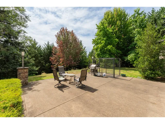 a view of a park with swings and slides