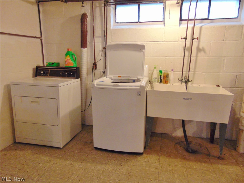 5000 East Pleasant Valley Road Independence, OH 44131 - Photo 23 of 28 laundry area of the basement, the rest of this room is as large as the rec room area, perfect for storage!