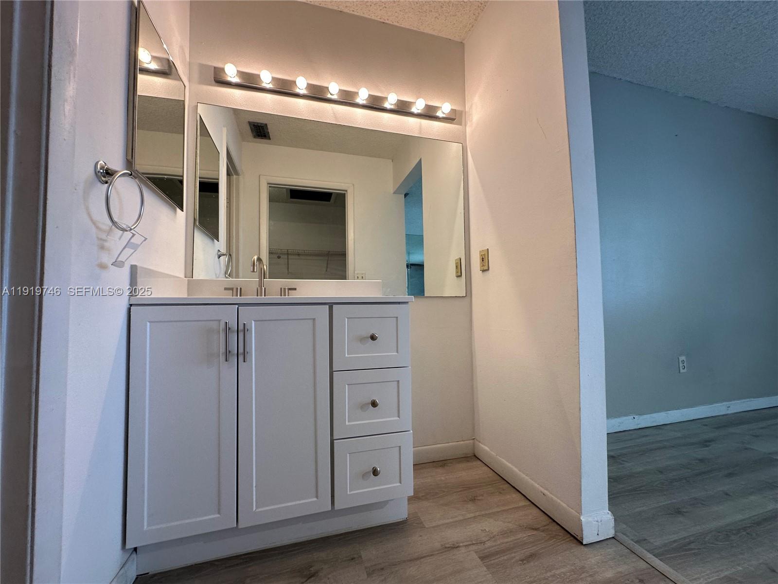 1024 South Independence Drive, Unit 1024A Homestead, FL 33034 - Photo 12 of 26 wooden floor in a gallery
