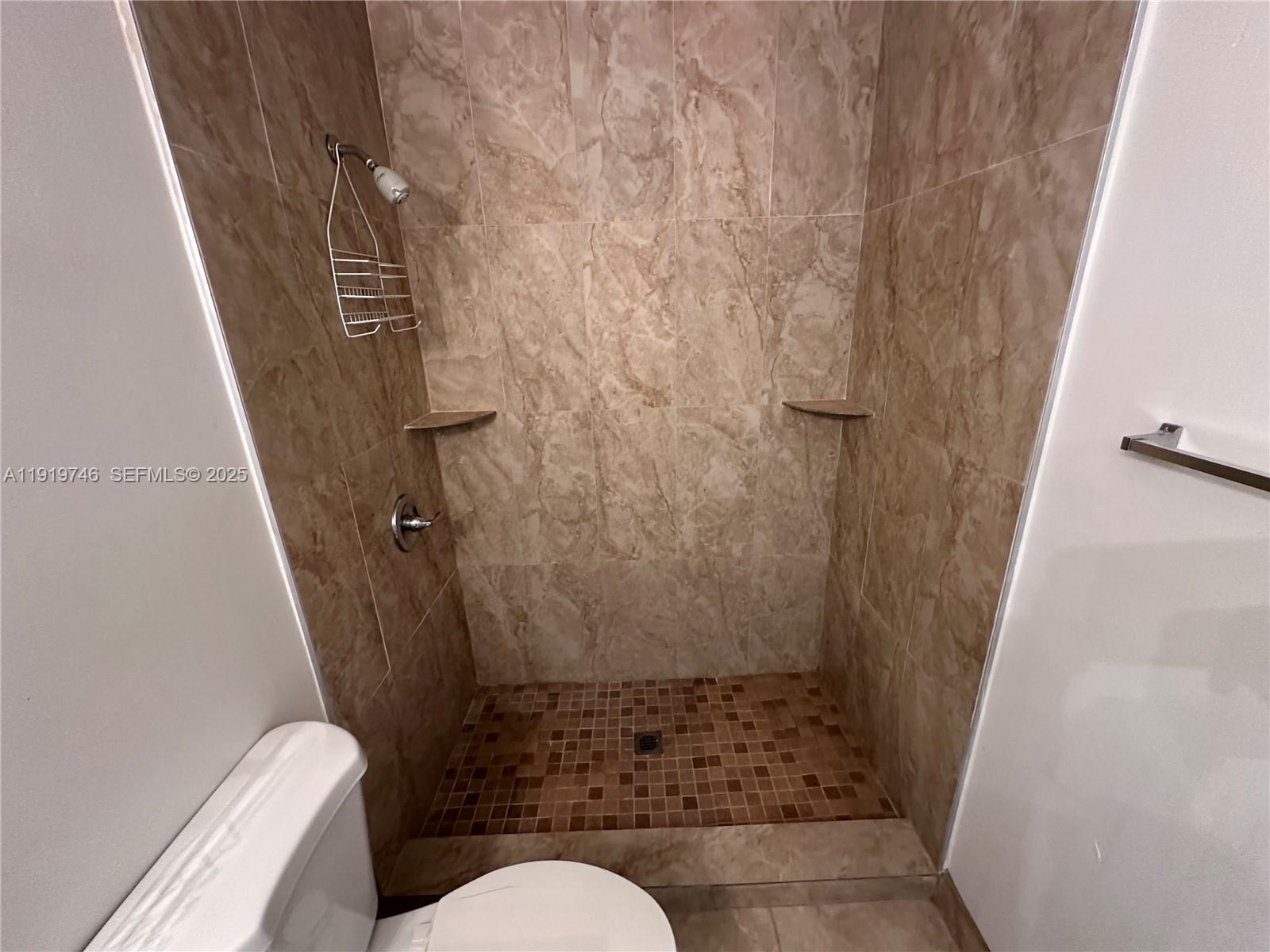 1024 South Independence Drive, Unit 1024A Homestead, FL 33034 - Photo 23 of 26 a bathroom with a toilet and a shower
