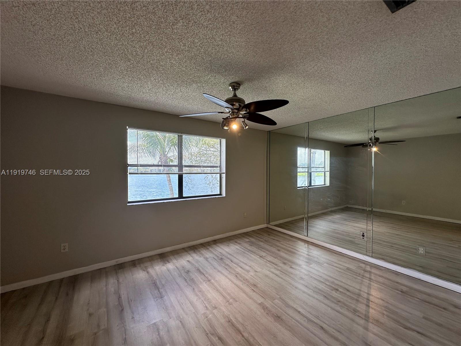 1024 South Independence Drive, Unit 1024A Homestead, FL 33034 - Photo 10 of 26 a view of an empty room with a window