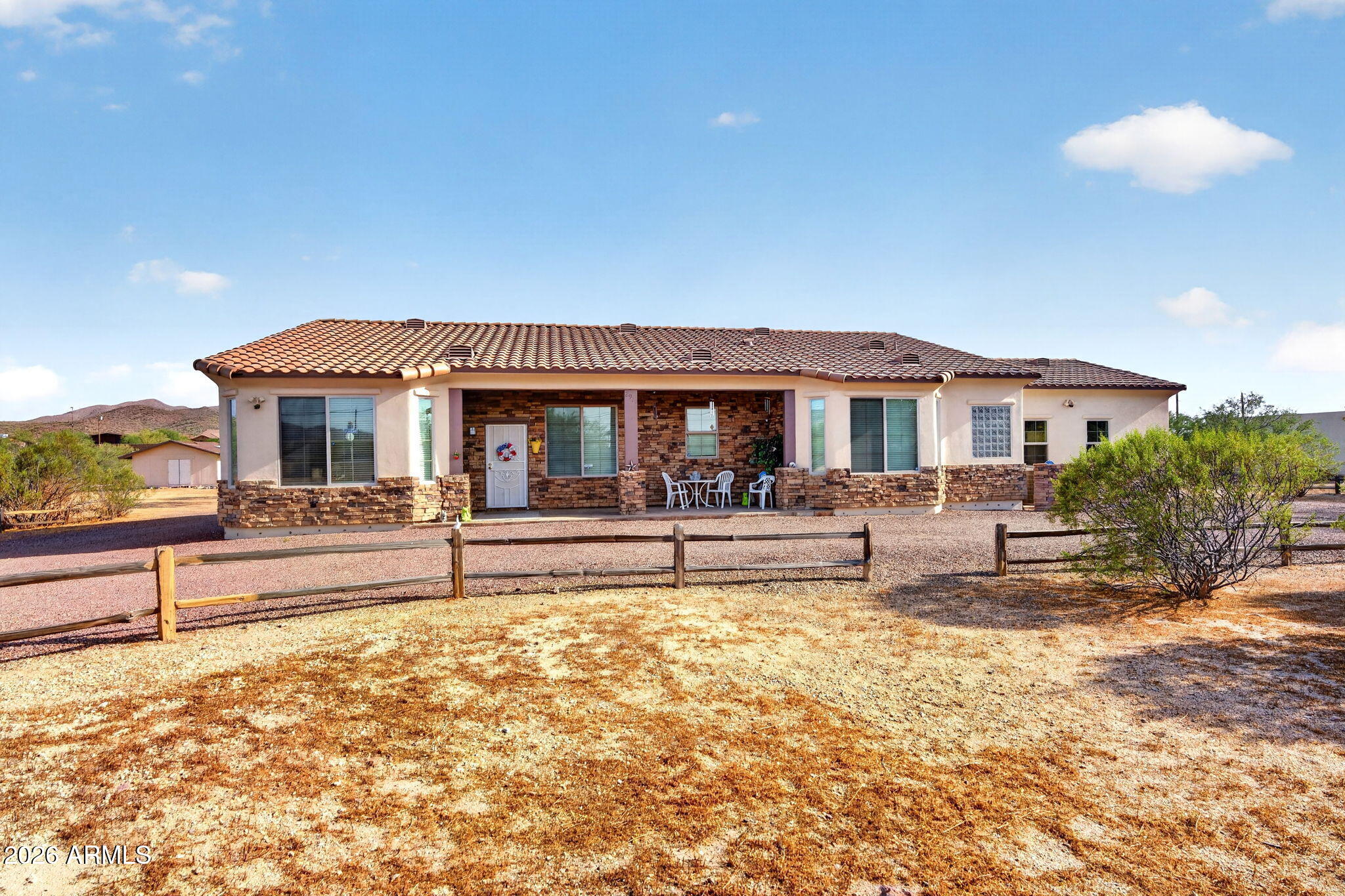 2929 West New River Road New River, AZ 85087 - Photo 1 of 53 a view of house with a yard and swimming pool