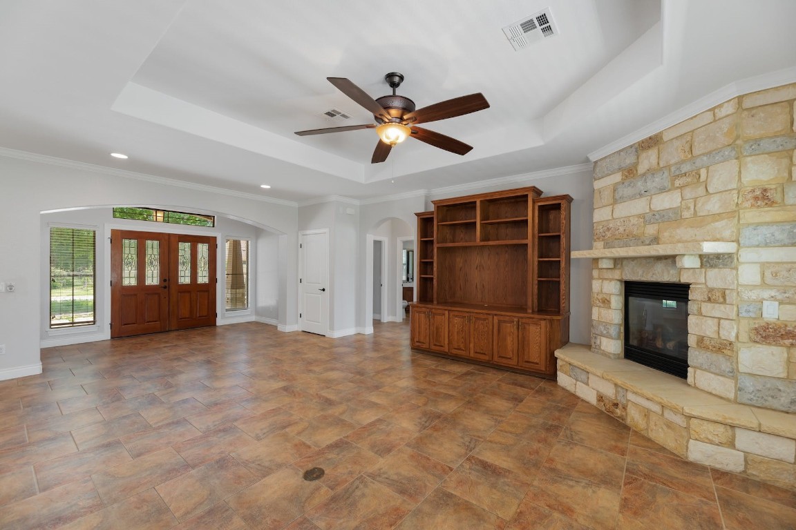 1001 Fort Davis Street Georgetown, TX 78633 - Photo 15 of 40 an empty room with windows and fireplace