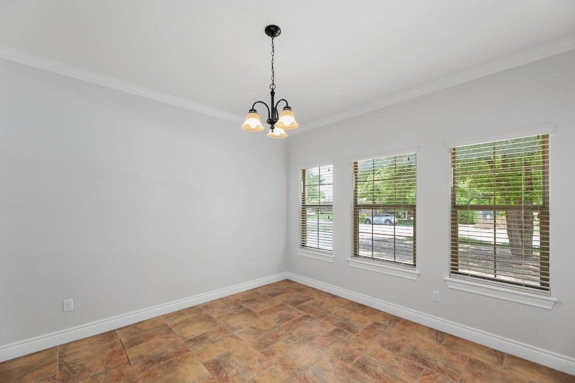 1001 Fort Davis Street Georgetown, TX 78633 - Photo 17 of 40 a view of a room with windows and chandelier