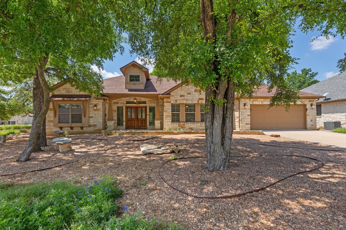 1001 Fort Davis Street Georgetown, TX 78633 - Photo 3 of 40 a front view of a house with garden