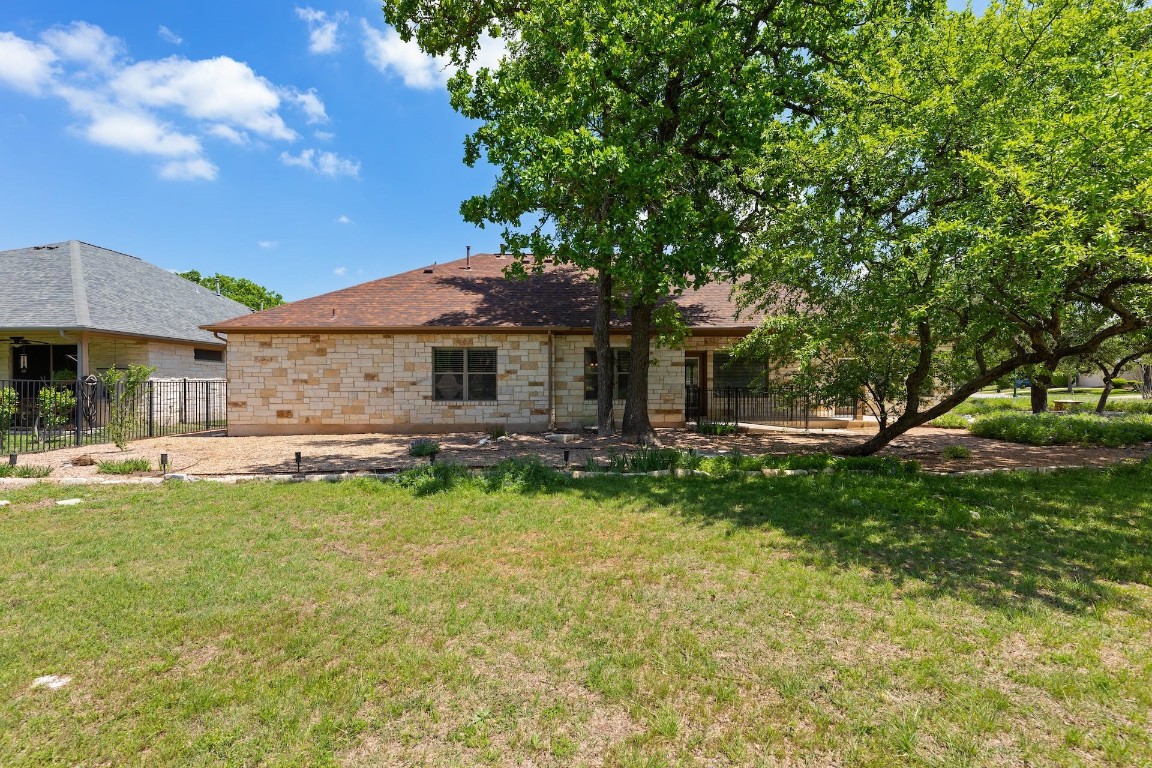 1001 Fort Davis Street Georgetown, TX 78633 - Photo 37 of 40 a front view of a house with a garden