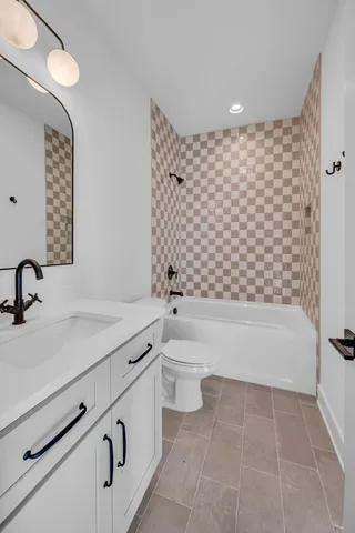 a backyard of a house with wooden fence