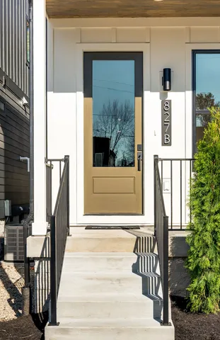 a bathroom with a granite countertop sink a toilet and bathtub