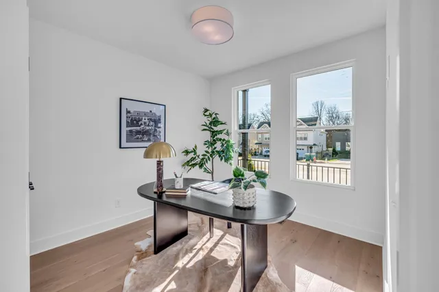 a kitchen with stainless steel appliances a refrigerator and a stove top oven