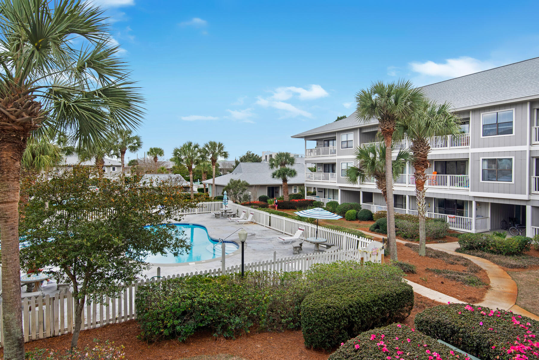 3799 East County Highway 30A, Unit E11 Santa Rosa Beach, FL 32459 - Photo 16 of 31 a house with palm tree in front of it