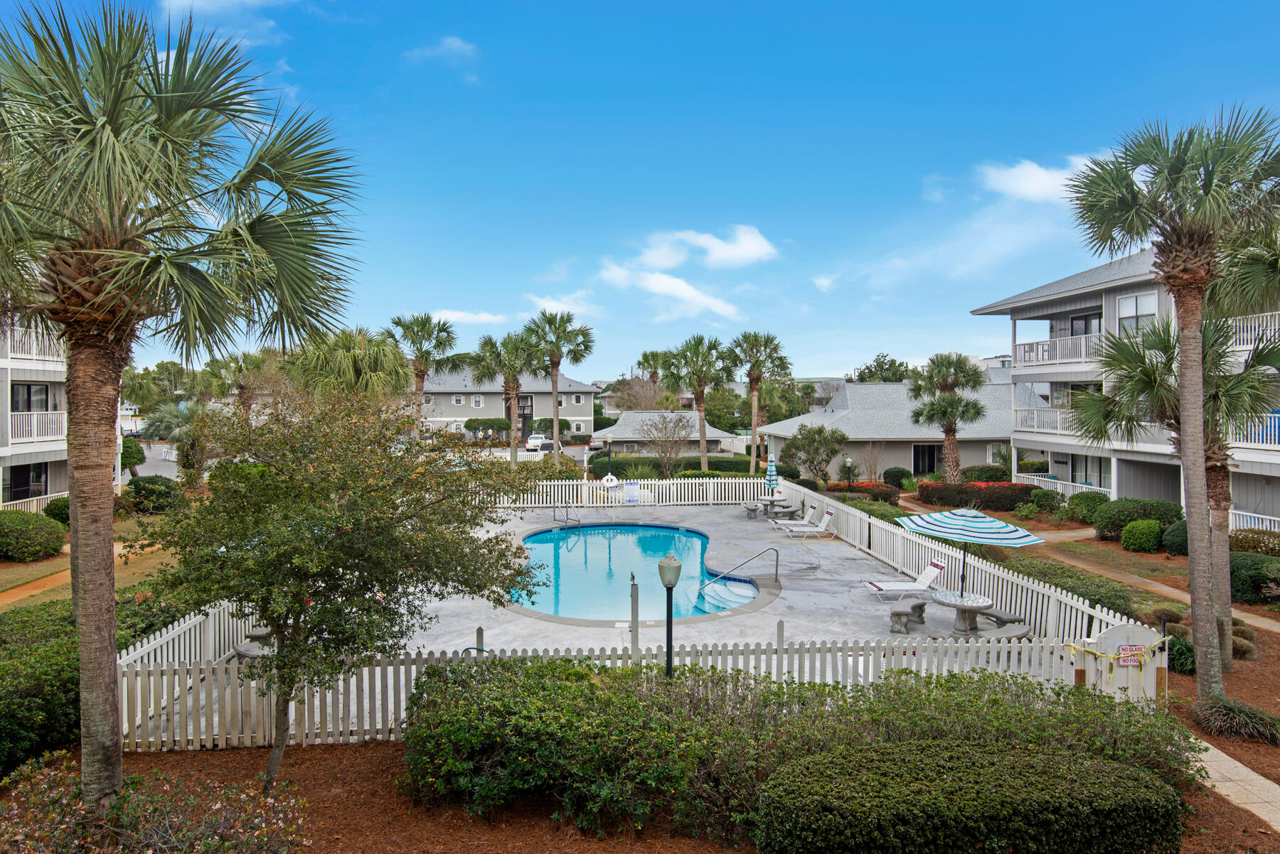 3799 East County Highway 30A, Unit E11 Santa Rosa Beach, FL 32459 - Photo 17 of 31 a swimming pool with outdoor seating and yard