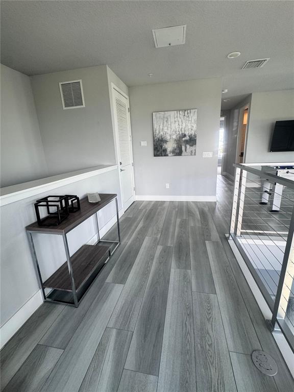 7770 Sandy Ridge Drive, Unit 210 Reunion, FL 34747 - Photo 14 of 42 a view of workspace with wooden floor