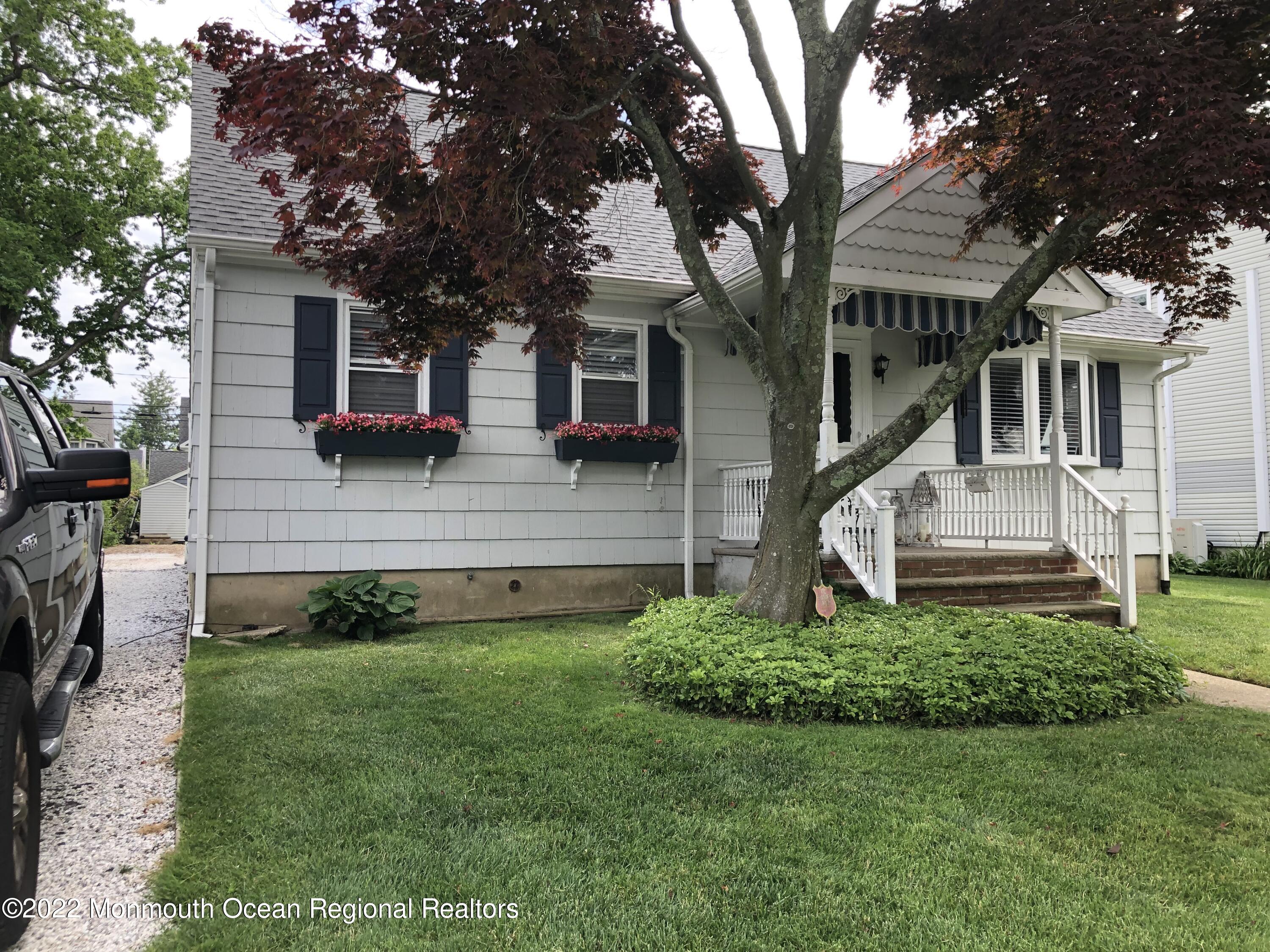 419 Jersey Avenue Spring Lake, NJ 07762 - Photo 29 of 32 a front view of a house with a yard