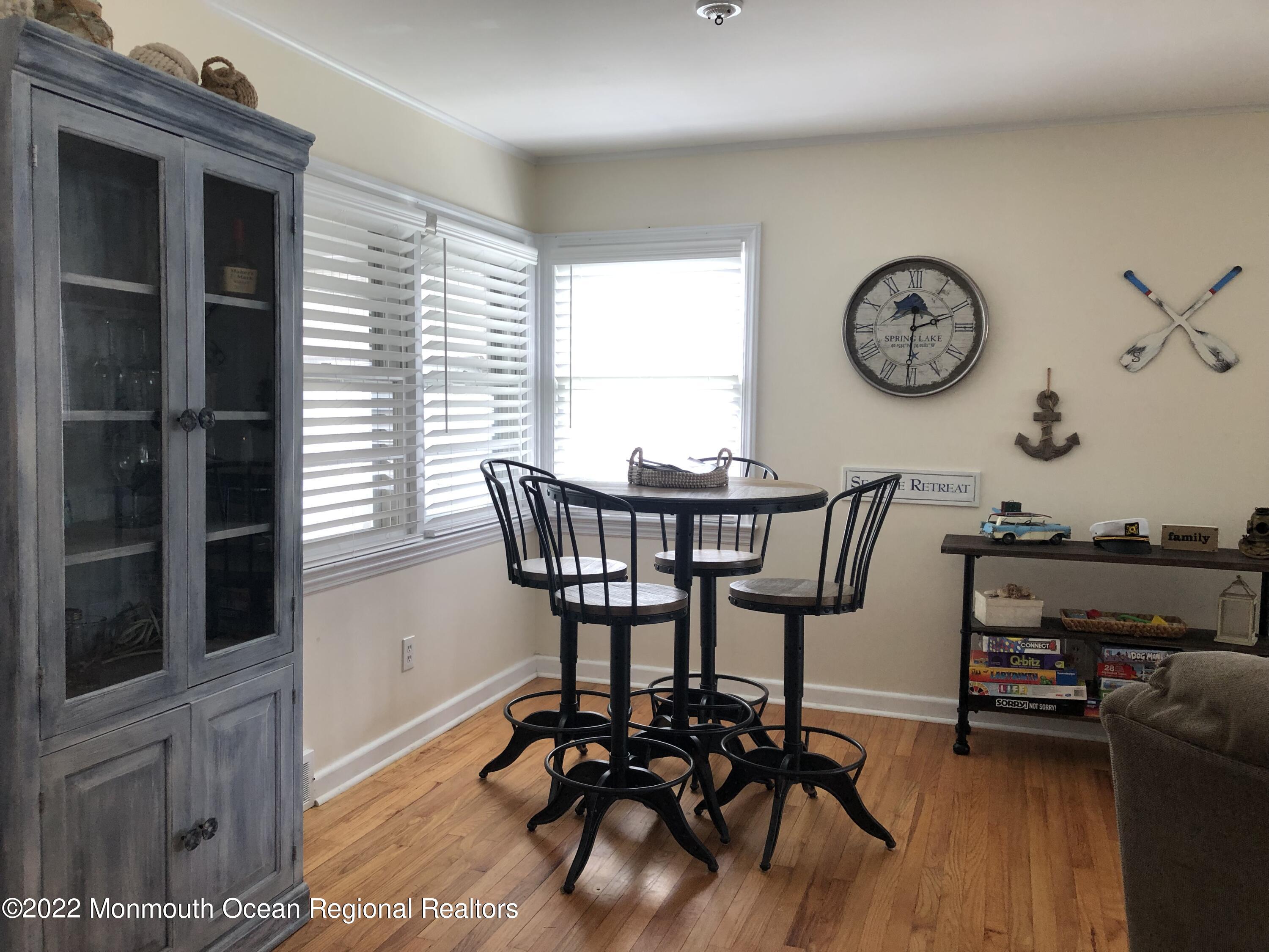 419 Jersey Avenue Spring Lake, NJ 07762 - Photo 8 of 32 a view of a room with furniture and wooden floor