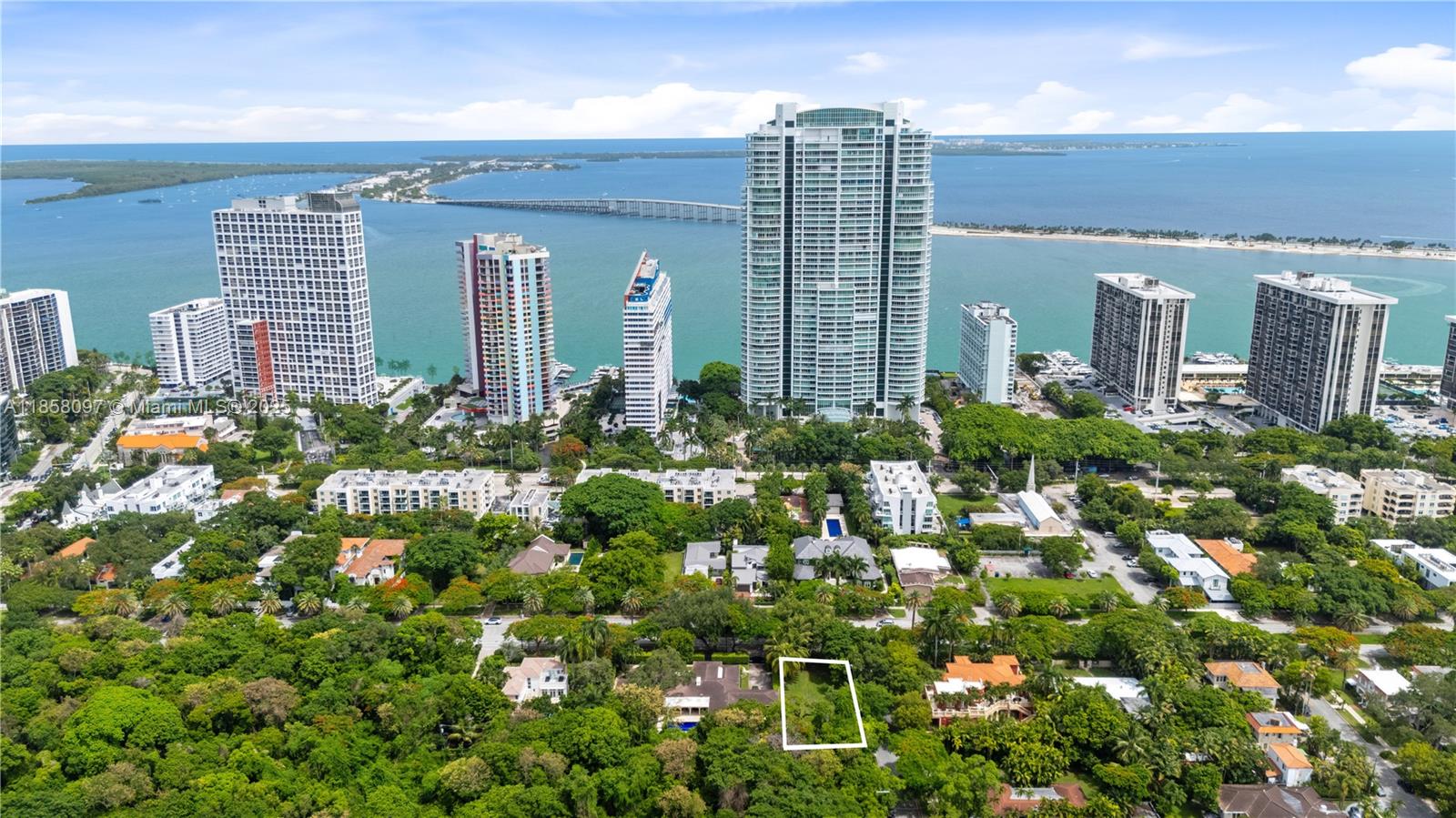 1644 South Miami Avenue Miami, FL 33129 - Photo 13 of 15 a view of a large building with a flower garden