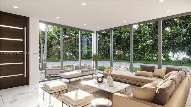 a living room with furniture and a floor to ceiling window