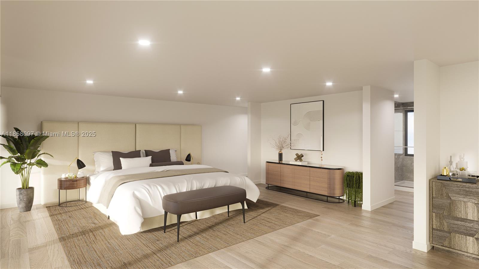 1644 South Miami Avenue Miami, FL 33129 - Photo 7 of 15 a spacious bedroom with a bed a mirror and desk