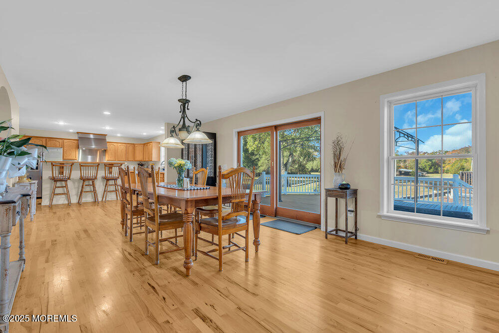 87 Maple Avenue Tuckerton, NJ 08087 - Photo 11 of 48 a view of a dining room with furniture window and wooden floor