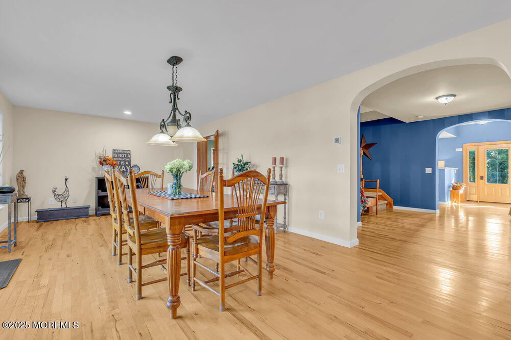 87 Maple Avenue Tuckerton, NJ 08087 - Photo 23 of 48 a view of a dining room with furniture and wooden floor
