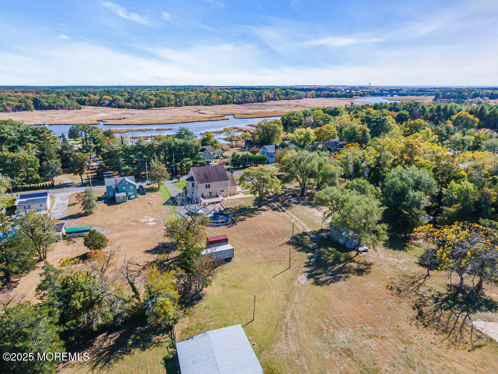 87 Maple Avenue Tuckerton, NJ 08087 - Photo 47 of 48 a view of a terrace with a table and chairs