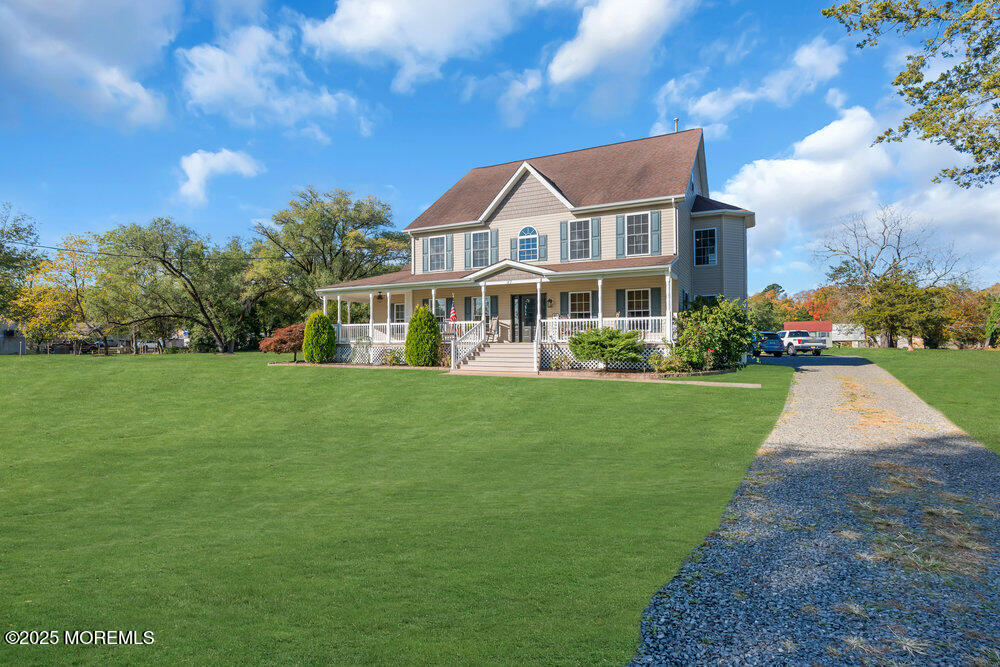 87 Maple Avenue Tuckerton, NJ 08087 - Photo 6 of 48 a front view of house with yard and green space