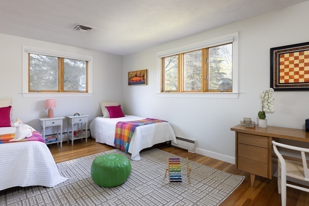 66 Roosevelt Road Newton, MA 02459 - Photo 10 of 17 a living room with furniture and a window