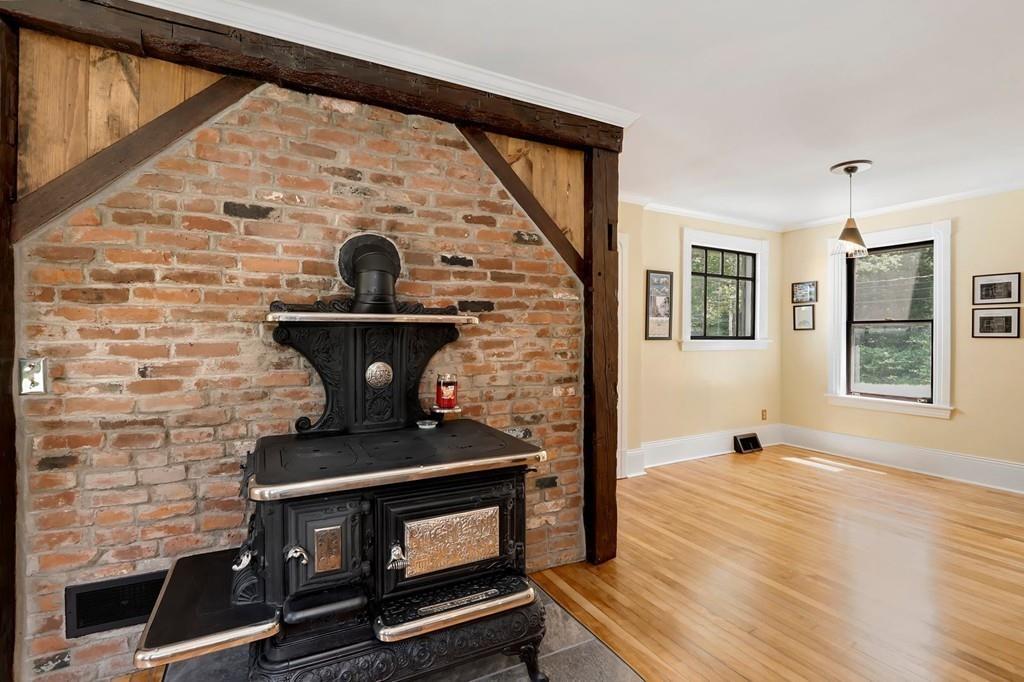 324 Turnpike Road Ashby, MA 01431 - Photo 11 of 41 a living room with a fireplace