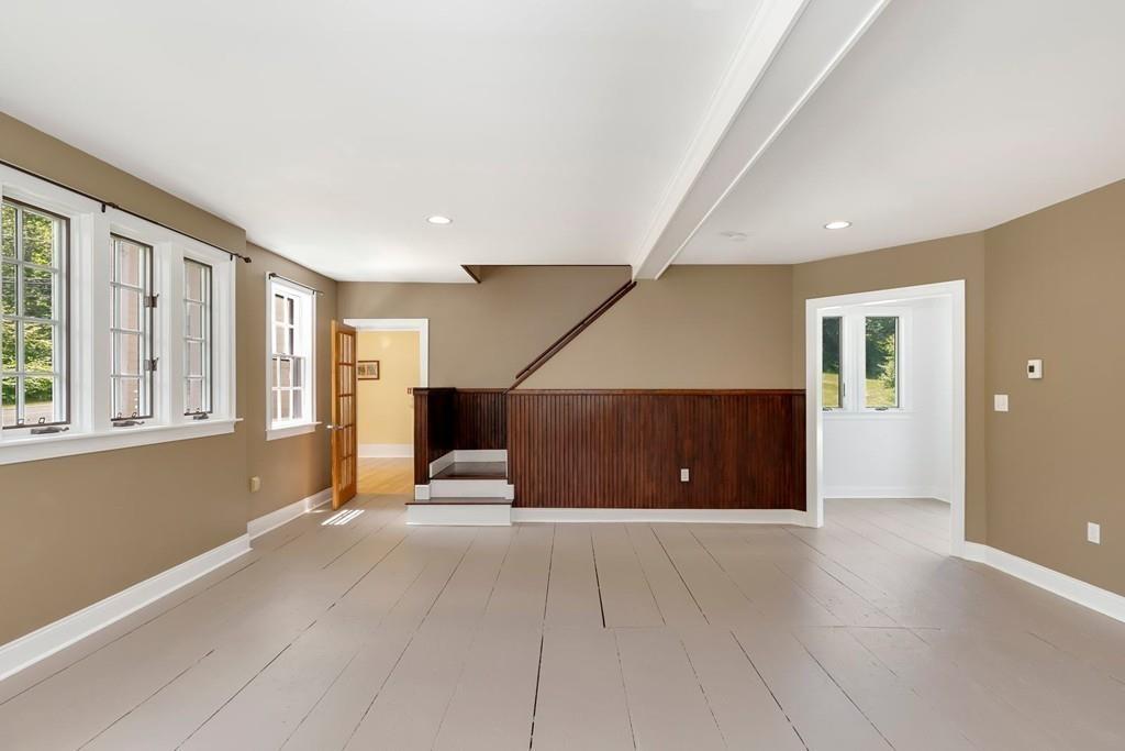 324 Turnpike Road Ashby, MA 01431 - Photo 21 of 41 a view of an empty room with wooden floor and windows