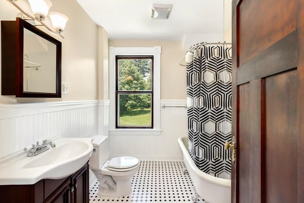324 Turnpike Road Ashby, MA 01431 - Photo 23 of 41 a bathroom with a sink a toilet and mirror