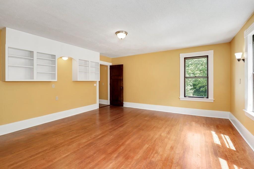 324 Turnpike Road Ashby, MA 01431 - Photo 28 of 41 a view of an empty room with wooden floor and a window
