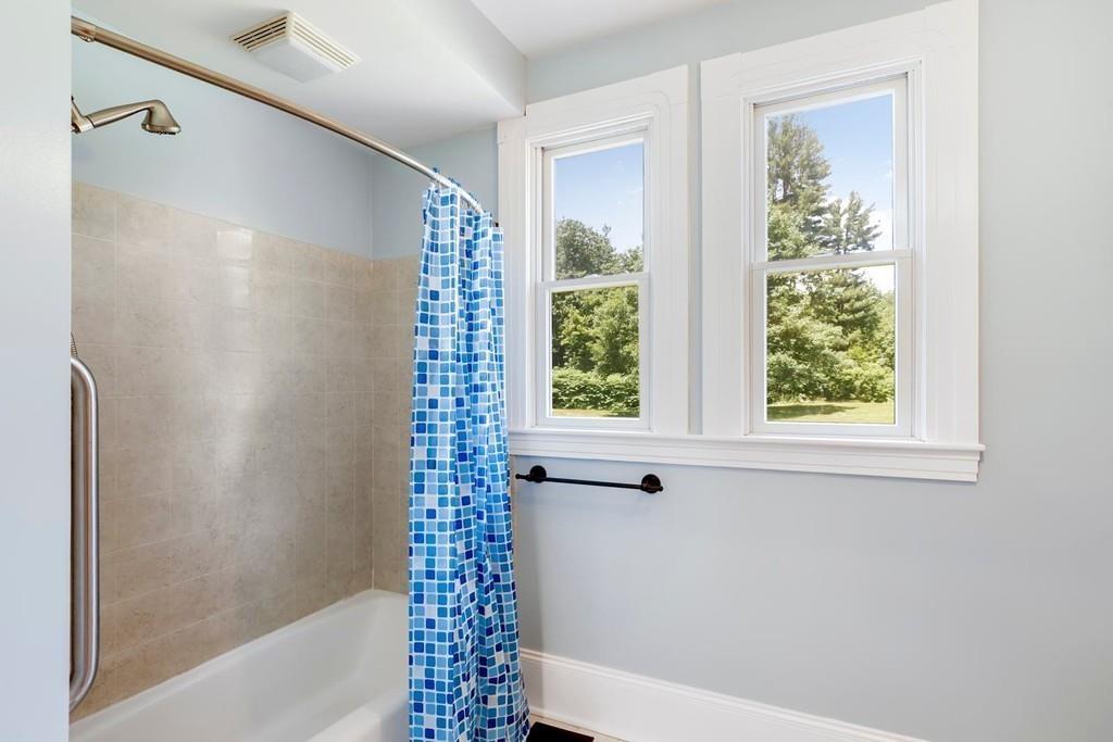 324 Turnpike Road Ashby, MA 01431 - Photo 34 of 41 a bathroom with a shower and a bathtub