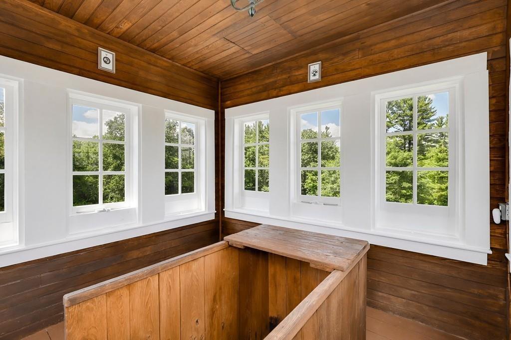 324 Turnpike Road Ashby, MA 01431 - Photo 38 of 41 a view of a room with wooden floor and outdoor seating