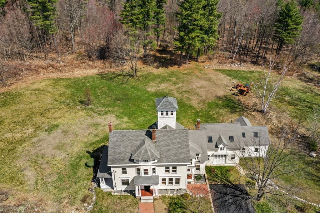 324 Turnpike Road Ashby, MA 01431 - Photo 4 of 41 a aerial view of a house with a yard