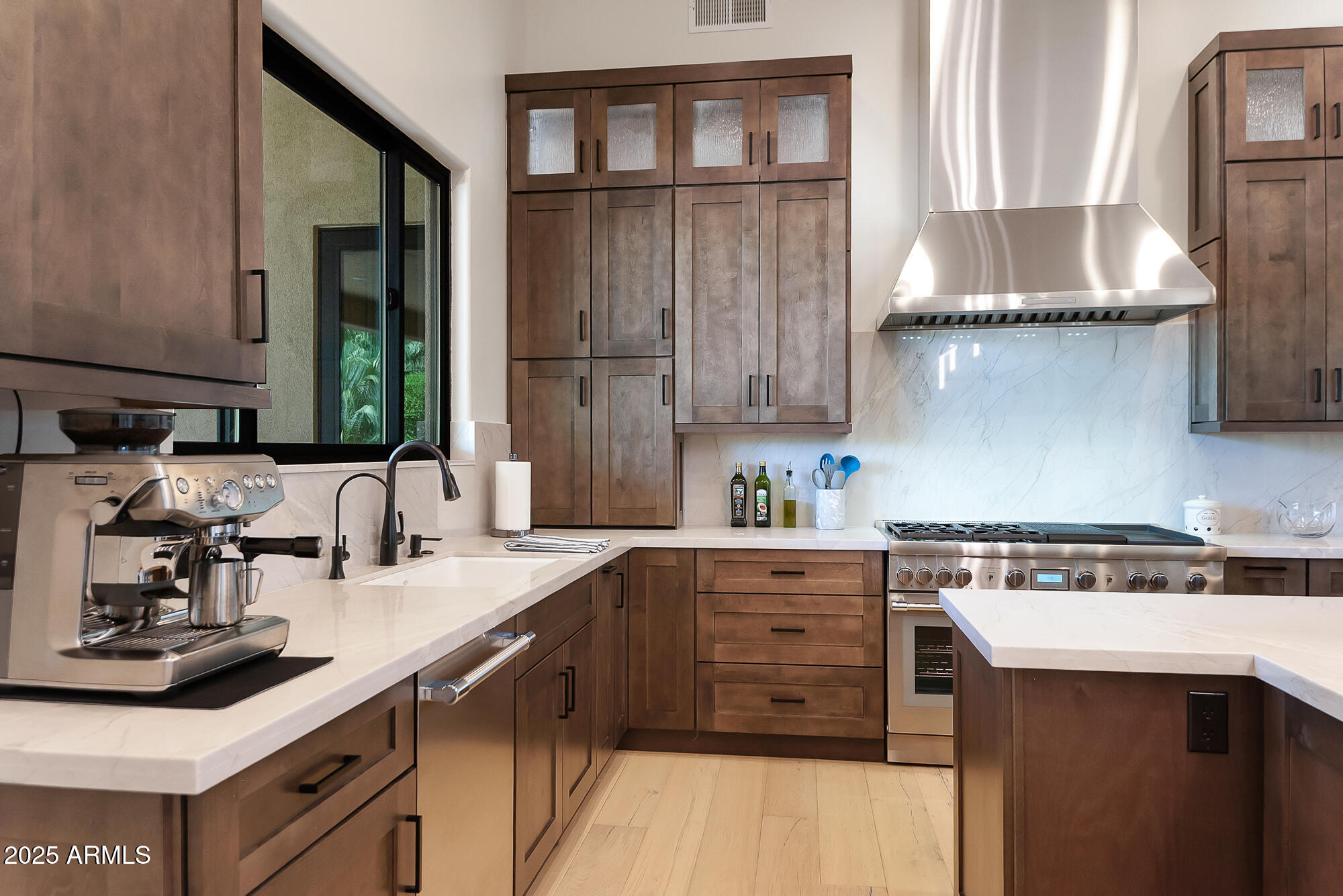 39419 7th Avenue Phoenix, AZ 85086 - Photo 11 of 51 a kitchen with a sink and cabinets