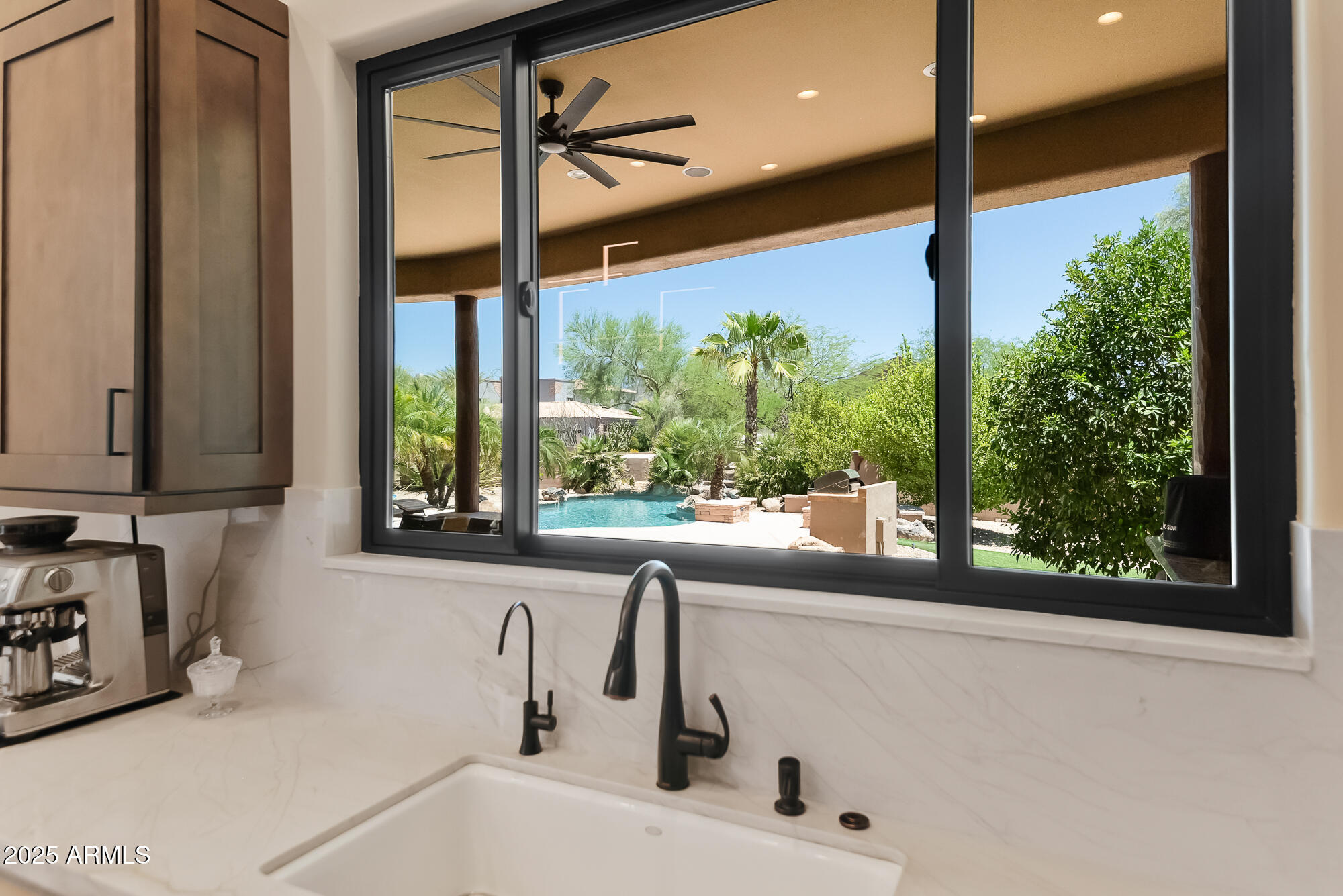 39419 7th Avenue Phoenix, AZ 85086 - Photo 13 of 51 a kitchen with a sink and a large window
