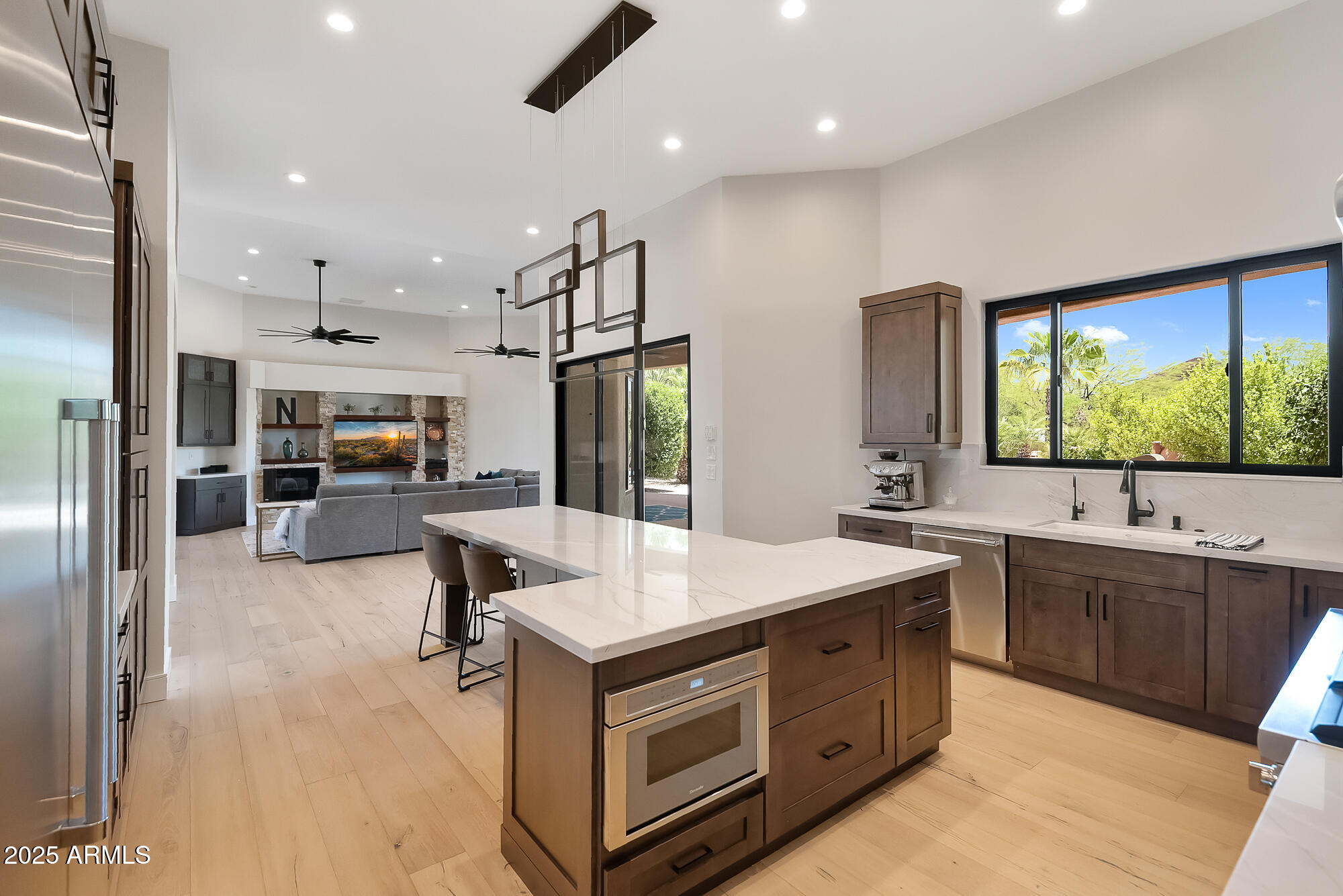 39419 7th Avenue Phoenix, AZ 85086 - Photo 14 of 51 a kitchen with kitchen island a sink appliances and a counter top space