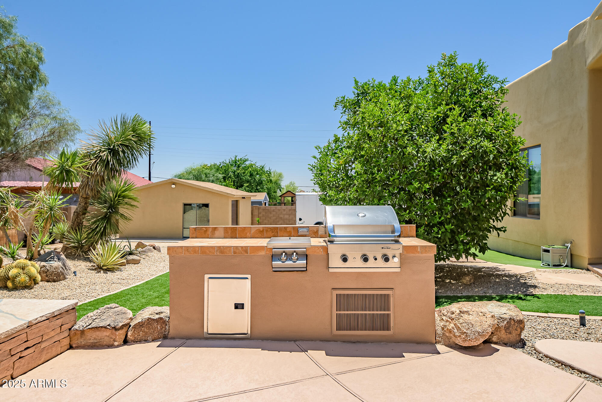 39419 7th Avenue Phoenix, AZ 85086 - Photo 21 of 51 a view of a house with a yard and a garage