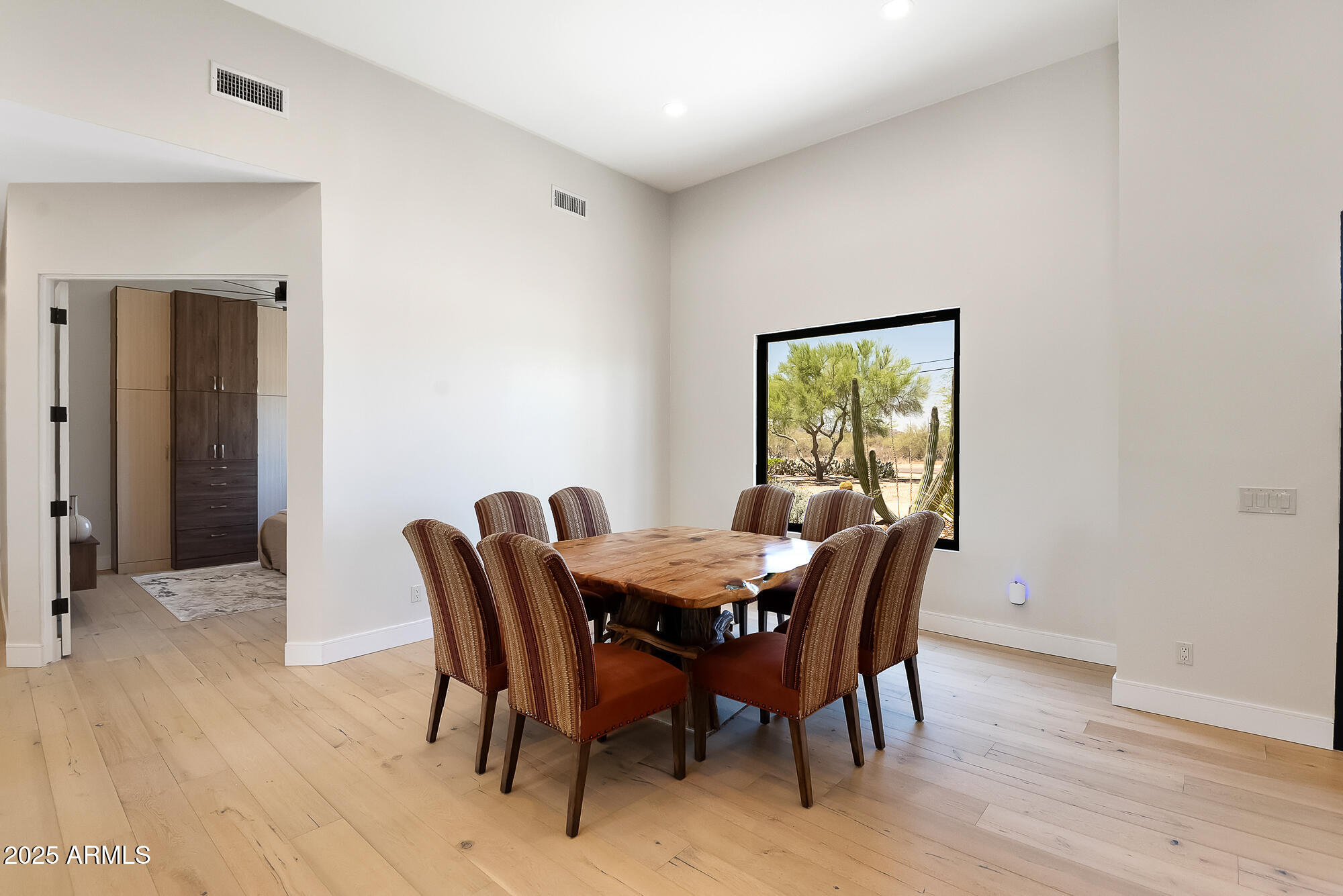 39419 7th Avenue Phoenix, AZ 85086 - Photo 34 of 51 a view of a dining room with furniture window and wooden floor