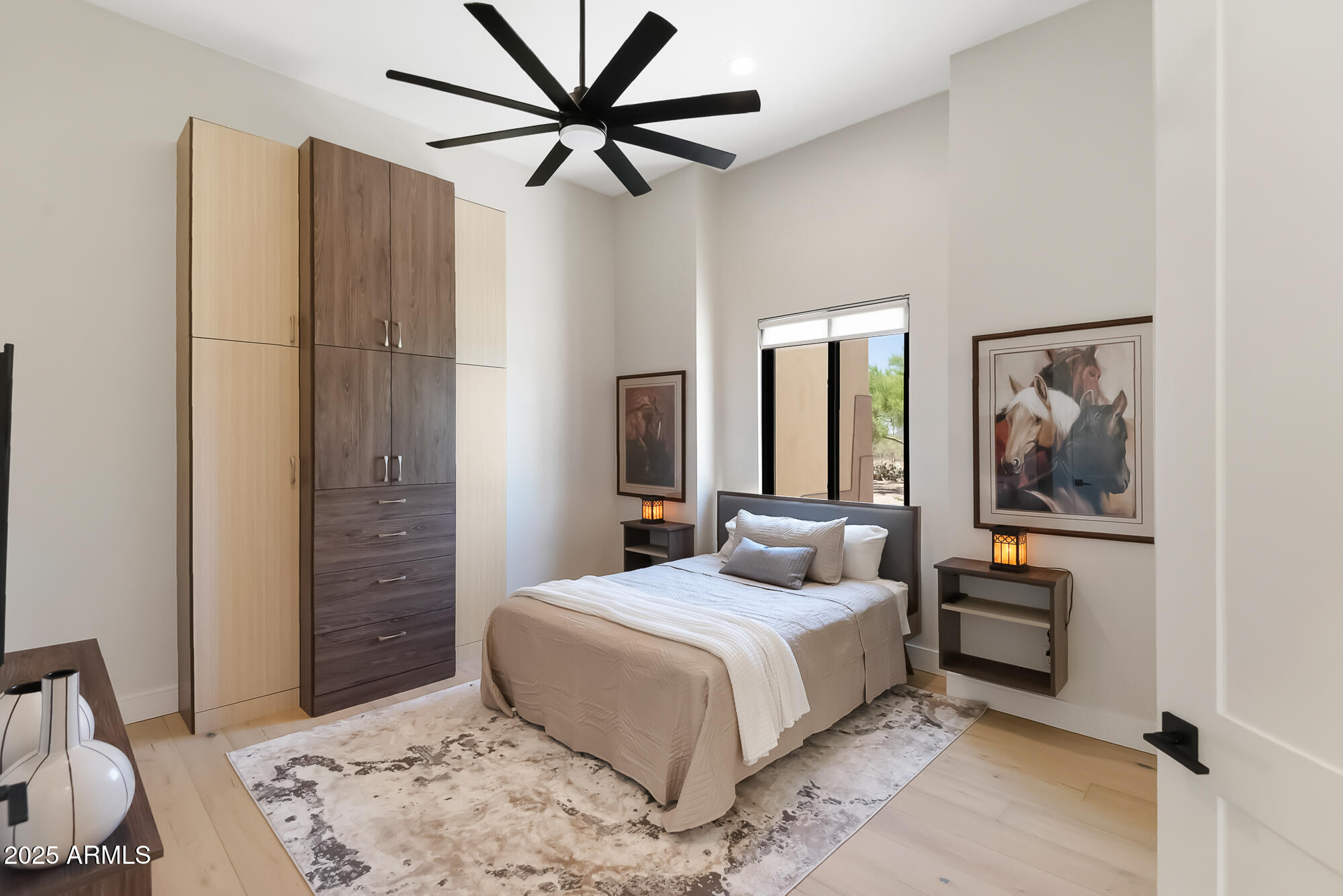 39419 7th Avenue Phoenix, AZ 85086 - Photo 35 of 51 a bedroom with a bed and a chandelier