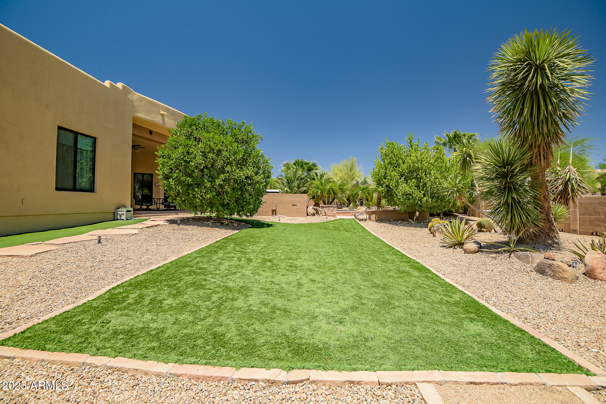 39419 7th Avenue Phoenix, AZ 85086 - Photo 46 of 51 a view of a backyard with a garden