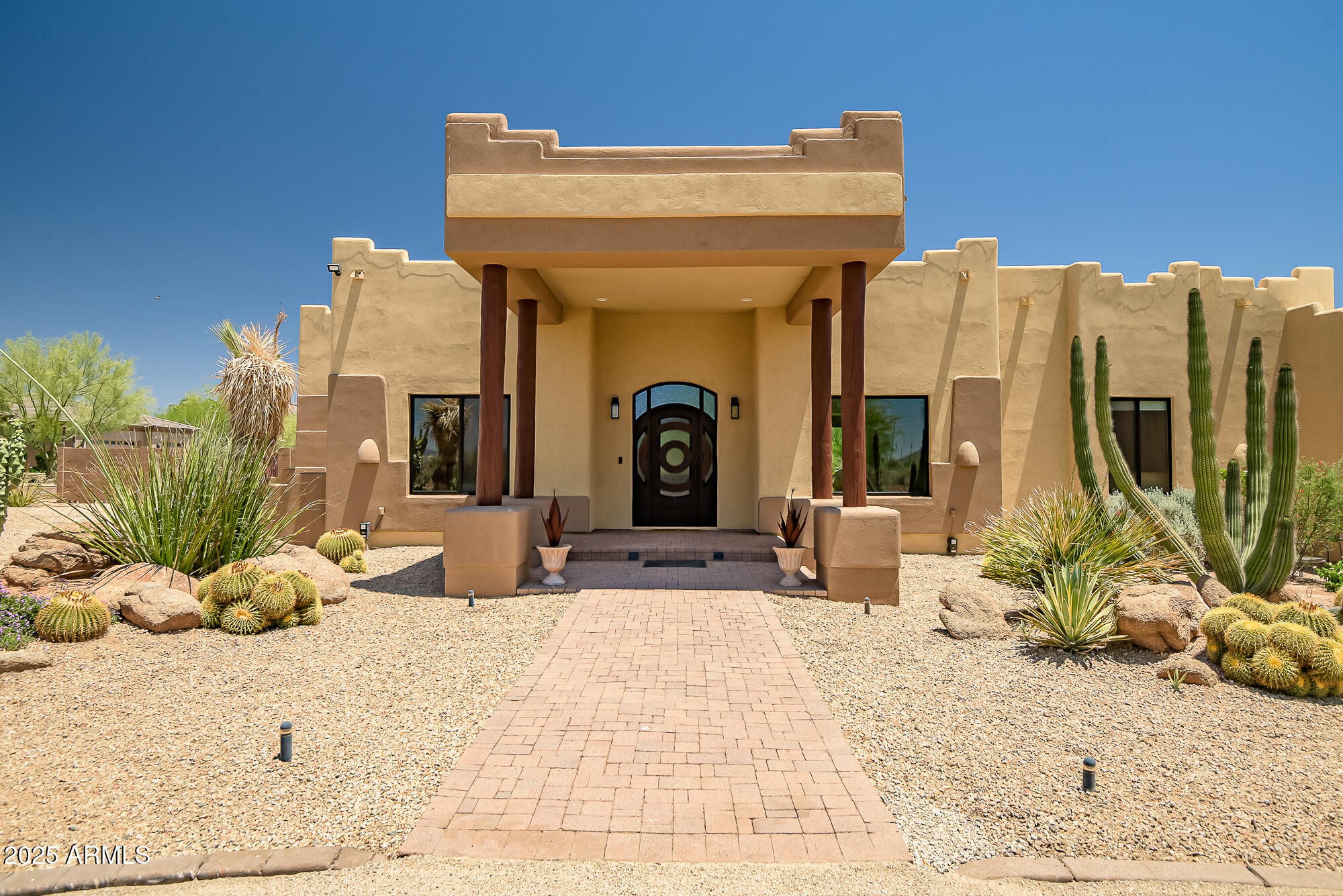 39419 7th Avenue Phoenix, AZ 85086 - Photo 6 of 51 a view of a lounge chair and glass door