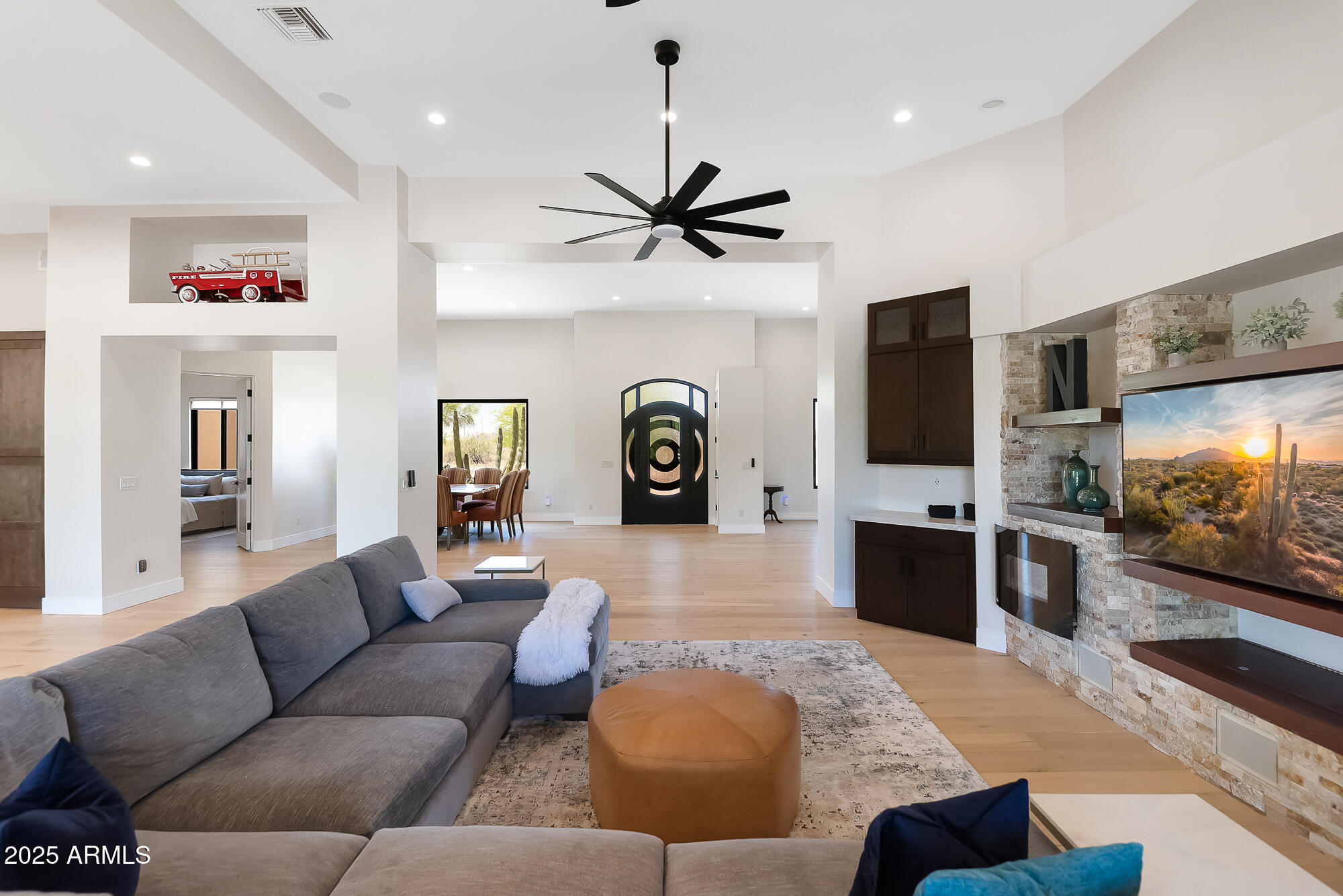 39419 7th Avenue Phoenix, AZ 85086 - Photo 9 of 51 a living room with furniture and a flat screen tv