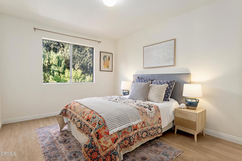 5436 McCulloch Avenue, Unit F Temple City, CA 91780 - Photo 23 of 33 a bedroom with bed and a window