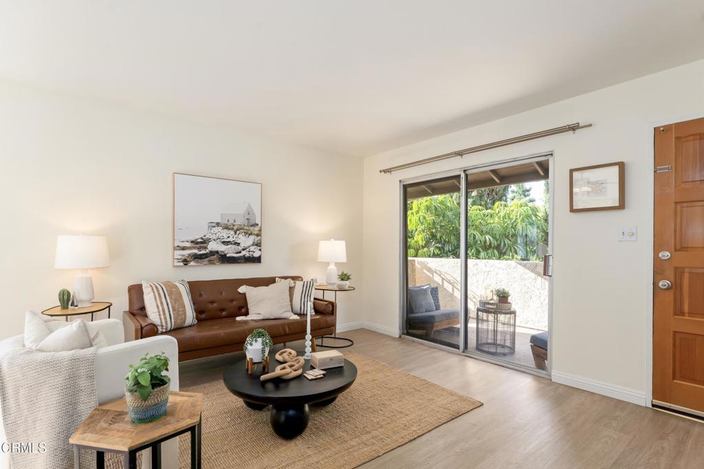 5436 McCulloch Avenue, Unit F Temple City, CA 91780 - Photo 4 of 33 a living room with furniture and a large window