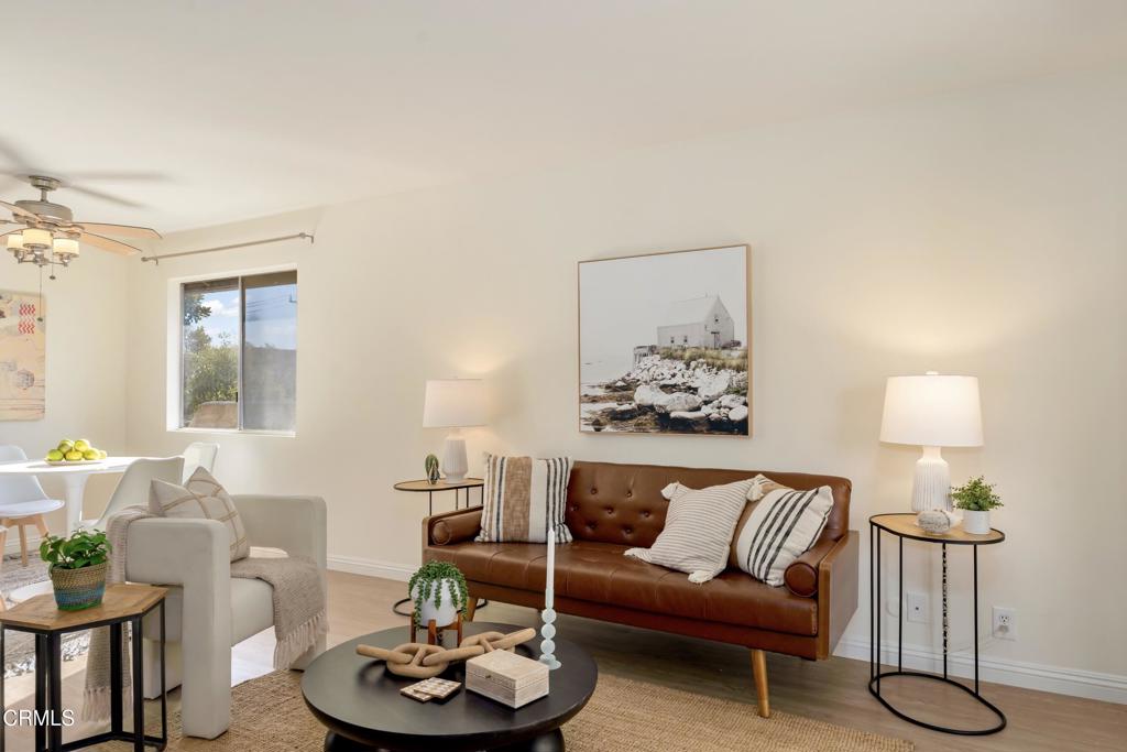 5436 McCulloch Avenue, Unit F Temple City, CA 91780 - Photo 6 of 33 a living room with furniture and a lamp