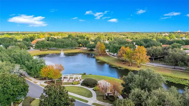 swimming pool view with a outdoor seating space