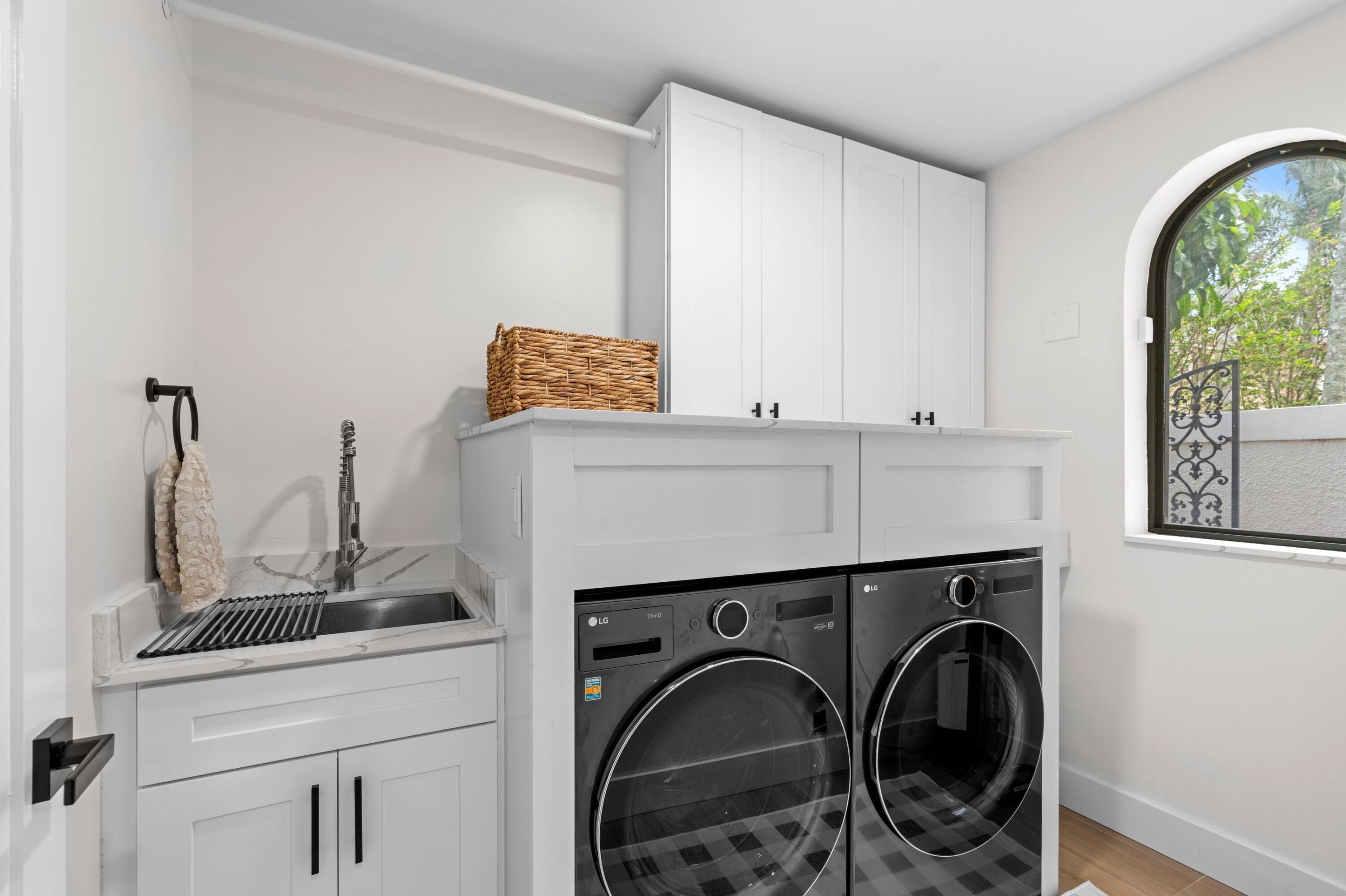 5552 North Ocean Boulevard, Unit 1A Ocean Ridge, FL 33435 - Photo 24 of 40 Laundry Room