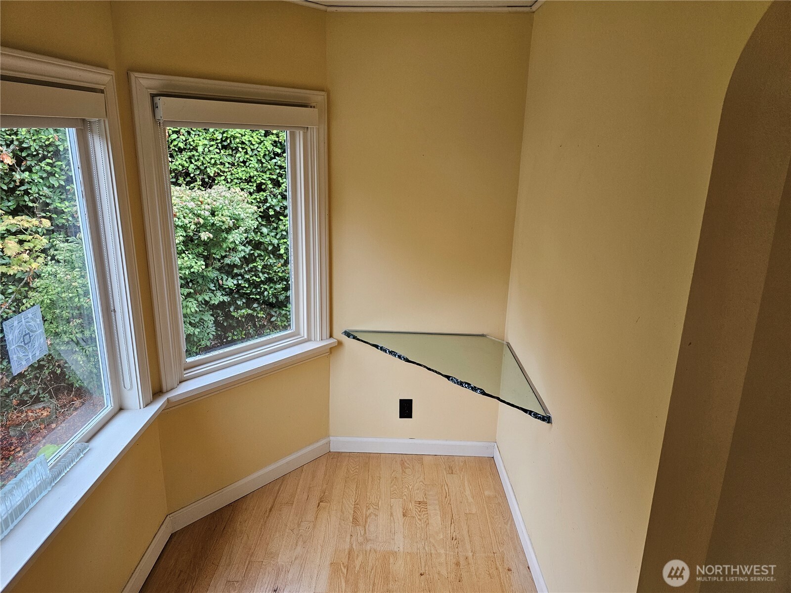 2822 Prosch Avenue West Seattle, WA 98119 - Photo 18 of 31 a view of a hallway with wooden floor and staircase