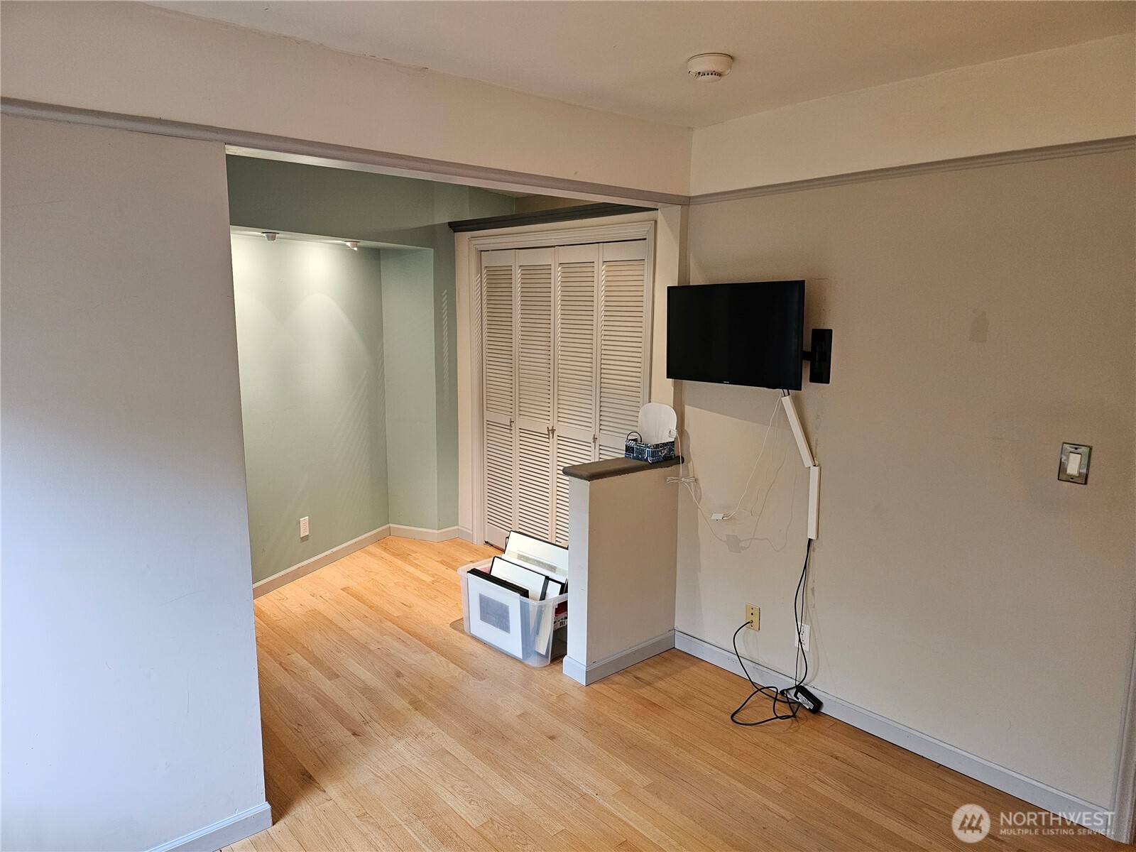 2822 Prosch Avenue West Seattle, WA 98119 - Photo 22 of 31 a view of a livingroom with chairs and a flat screen tv