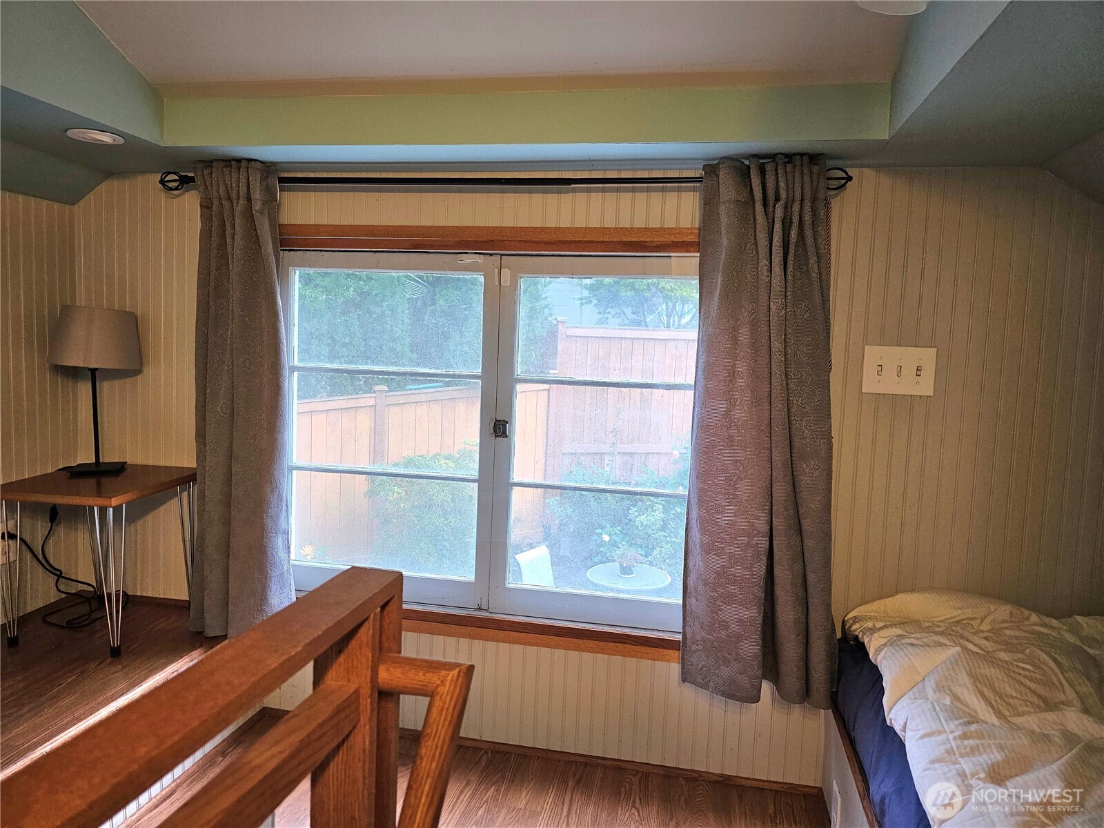 2822 Prosch Avenue West Seattle, WA 98119 - Photo 28 of 31 a bedroom with a bed and a window